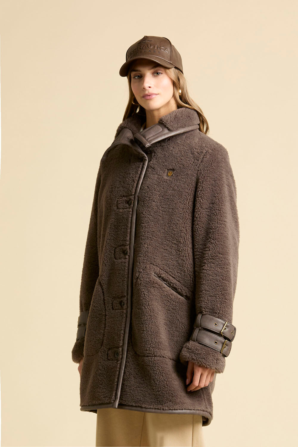 Faux fur coat with leather-effect detail