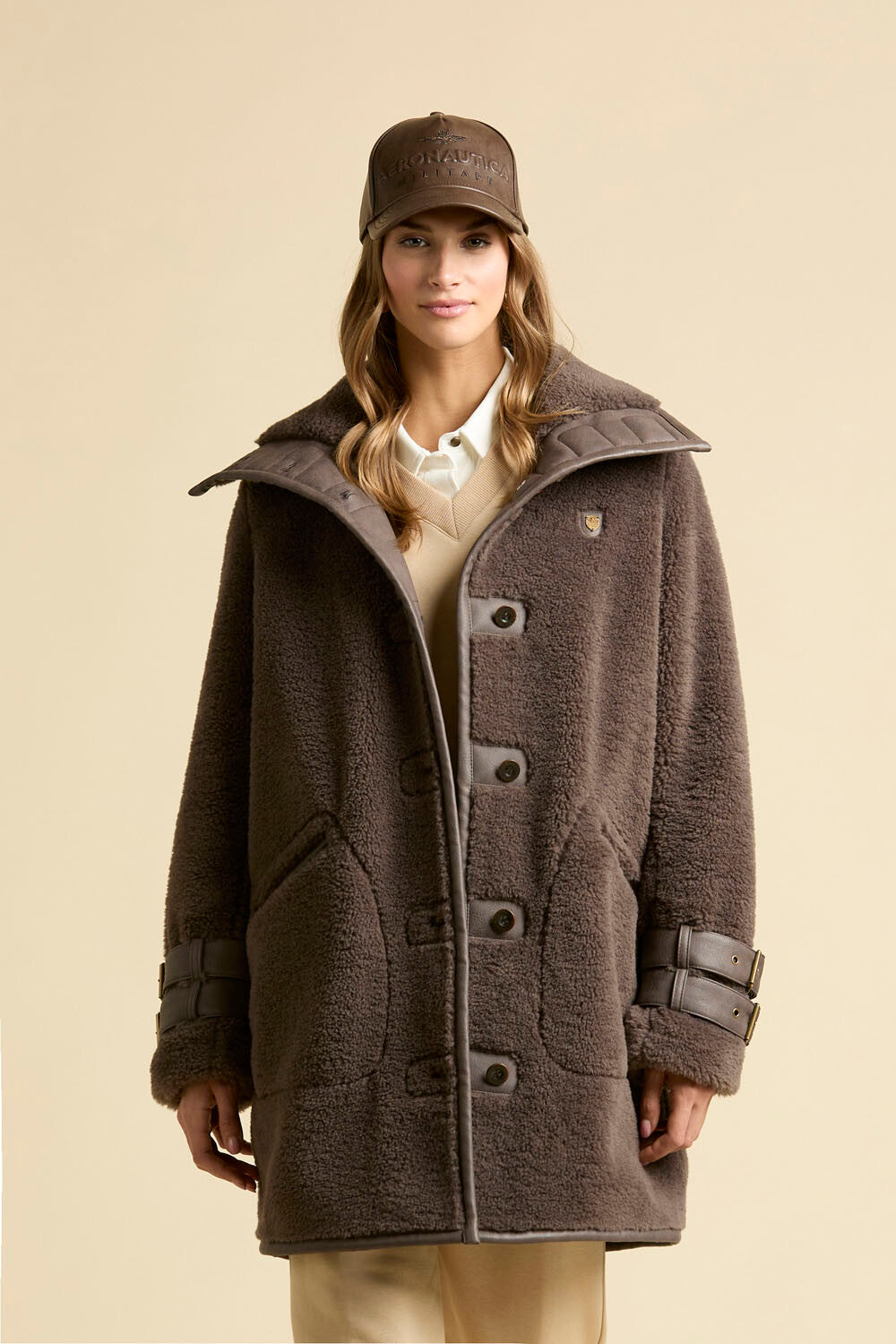 Faux fur coat with leather-effect detail