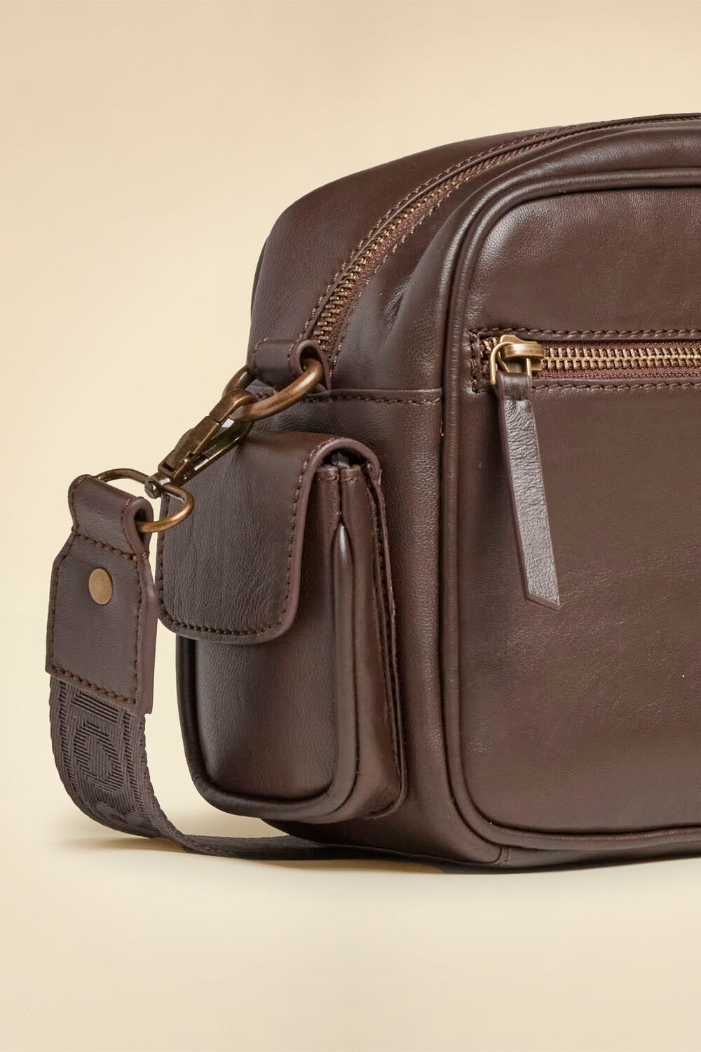 Multi-pocket leather crossbody bag