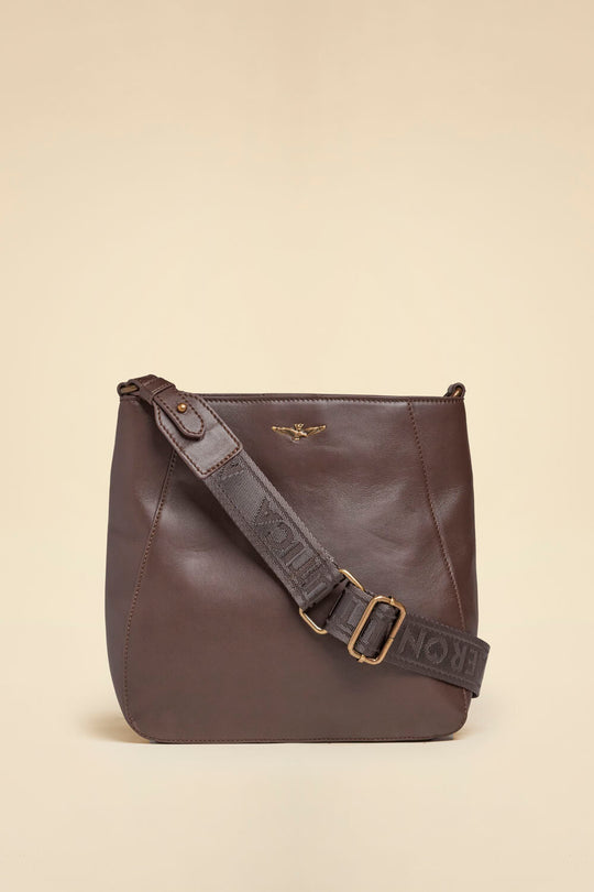 Shoulder bag with perforated logo