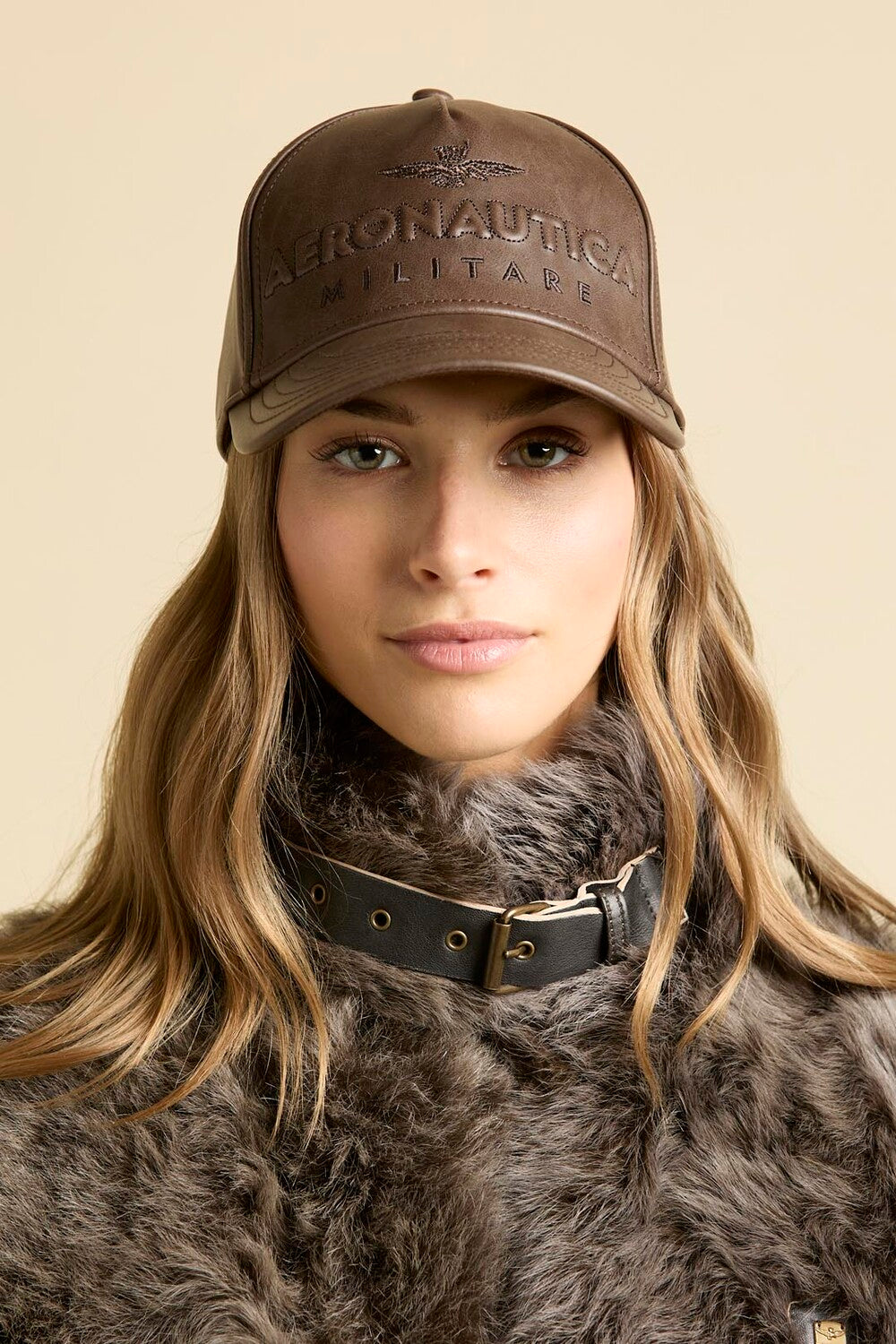 Faux leather cap with embossed logo