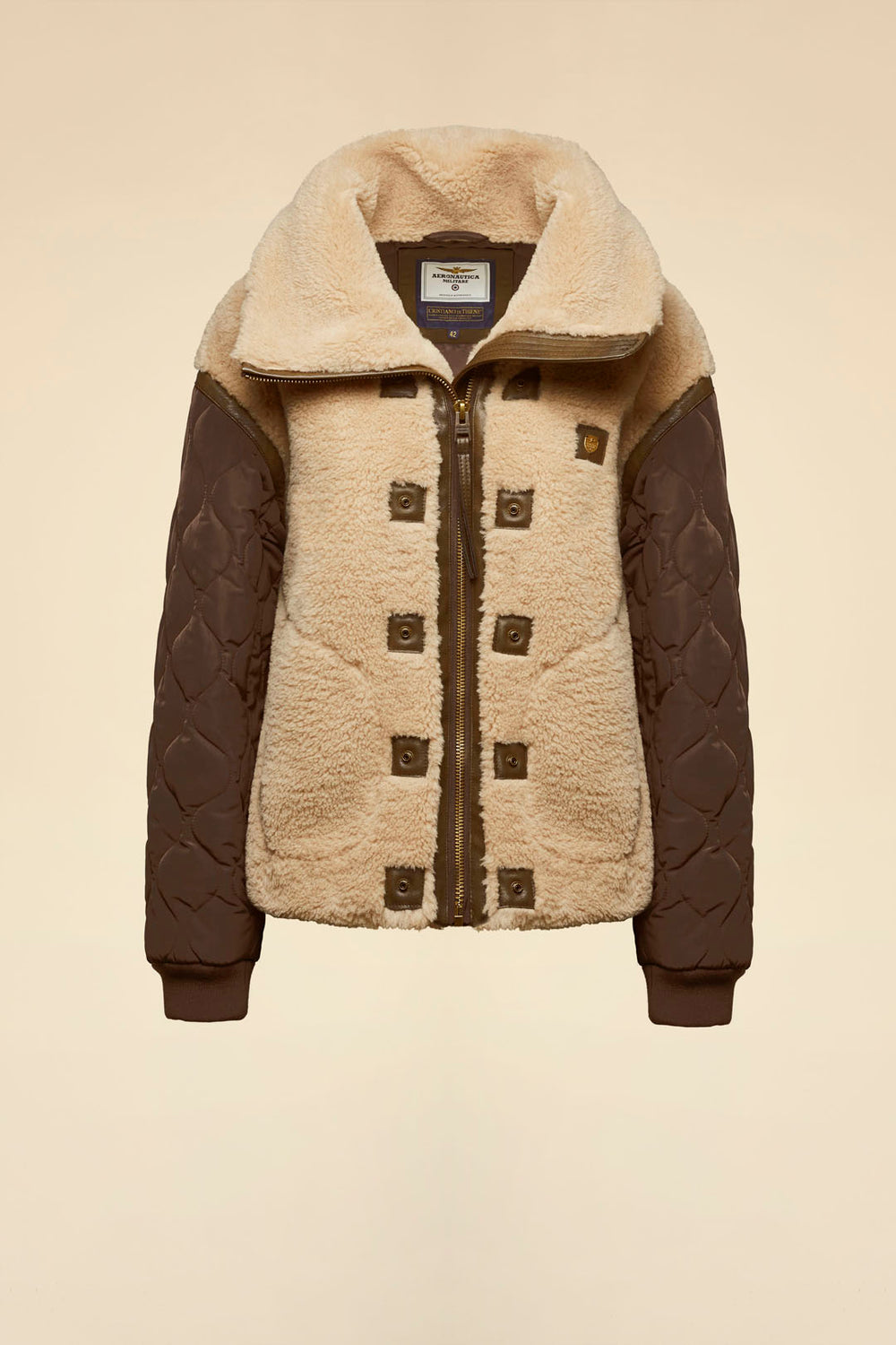 Faux fur coat with quilted sleeves