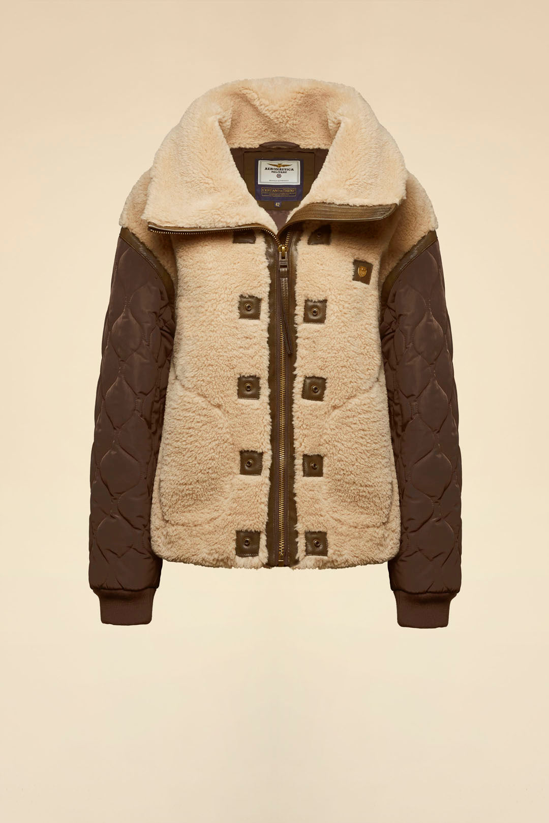 Faux fur coat with quilted sleeves