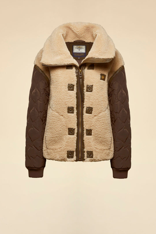 Faux fur coat with quilted sleeves