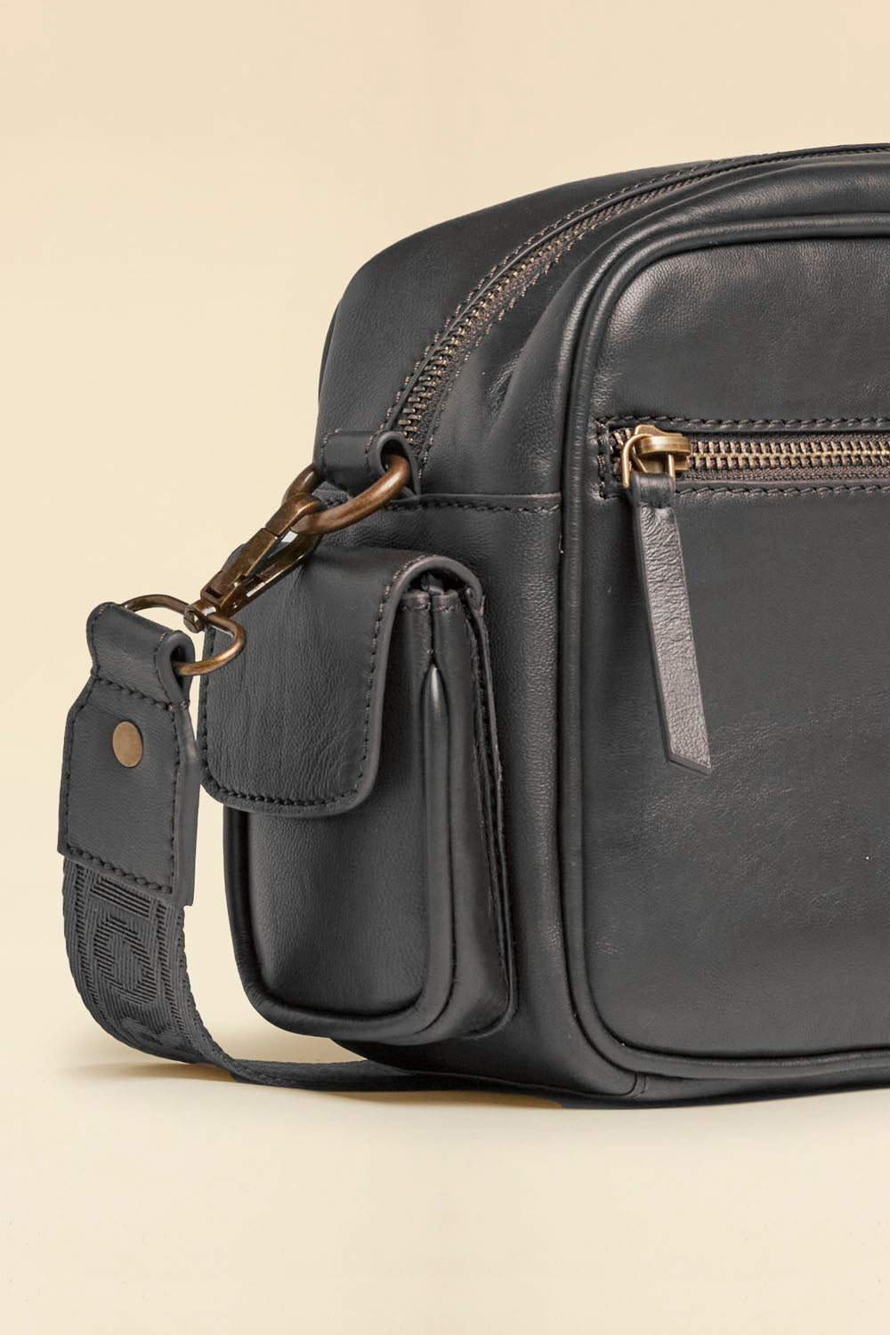 Multi-pocket leather crossbody bag